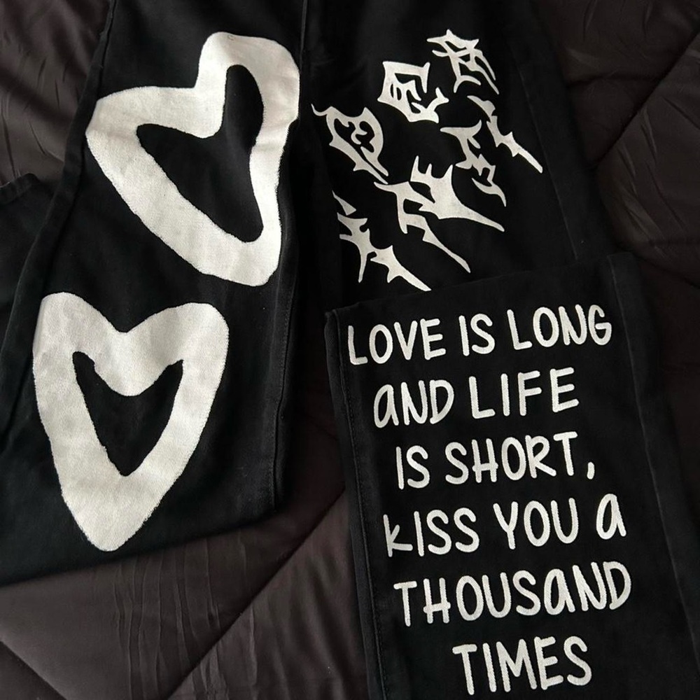 Black Pants with White Graphic Design